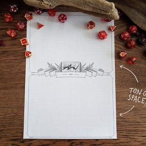 May include: A printable Dungeons and Dragons character sheet with a black and white illustration of a book with a dragon on the cover. The sheet has lined sections for character information and a large section for notes. There are red and gold dice scattered around the sheet.