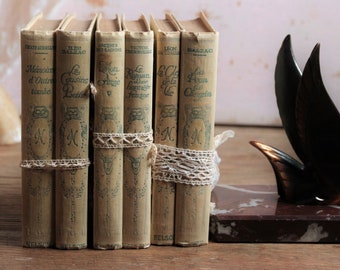 Set of 2 french pale yellow hardback books. 1920s. French vintage photo styling props. Pretty books shabby french.