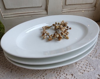 One antique french Paris porcelain oval platters.Thick heavy Paris porcelain serving platters. Heavy restaurant porcelain meat platters