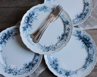 Set of 4 antique english flow blue transferware flat dinner plates. Henry Burgess