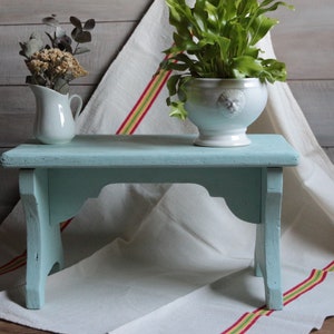 Antique french handmade painted wood foot stool. Turquoise light blue Primitive rustic wood foot rest. Farmhouse rustic decor.