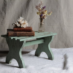 Antique french handmade painted wood foot stool. Light sage green Primitive rustic wood foot rest. Farmhouse rustic decor.