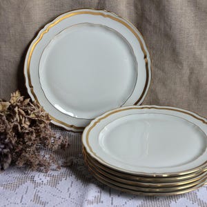 Set of 6 french vintage Raynaud Limoges porcelain plates. Gold and white dinner plates polished gold detail