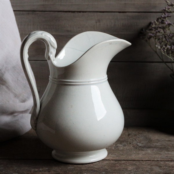 Antique french white footed ironstone washing pitcher. Antique white ironstone pitcher. French nordic decor.