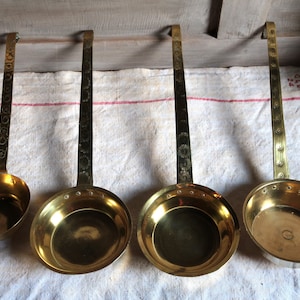 Set of 4 vintage brass kitchen ladles. Giant serving ladles Soup stew Spice wine Hot cider chili. Brass kitchen decor