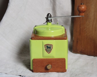 French vintage Peugeot frères manual coffee grinder. Pale lime green color metal. Pistachio color. French country kitchen.