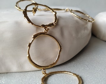Original and unique golden earrings, statement & elegant long earrings. Organic and rustic design earrings. Goldplated dangle earrings
