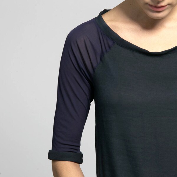 Half sleeve top with sheer raglan sleeves