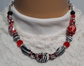 Touch of Wild Love Glass Lamp Work Heart Beads Necklace in Black, Red and White with Silver