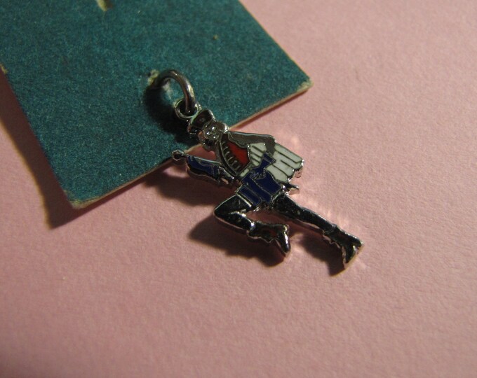 white Sterling Silver Female Charm Drum Major and blue. Enameled red