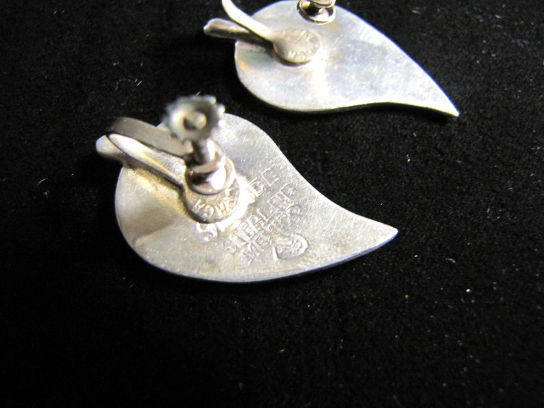 Lovely leaf shaped abalone in sterling setting. Bracelet and screw back earrings MEXICAN sterling Set