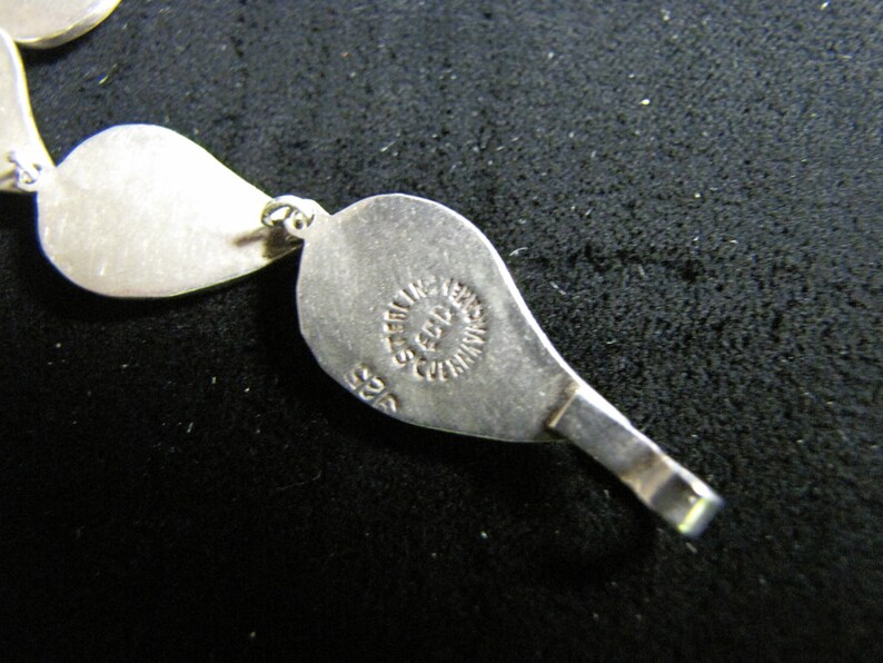 Lovely leaf shaped abalone in sterling setting. Bracelet and screw back earrings MEXICAN sterling Set