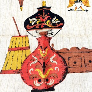 May include: A vintage fabric with a repeating pattern of stylized objects. The design includes a red and black lamp, a yellow and red broom, and a brown cabinet. The background is a light beige with a wood grain texture.