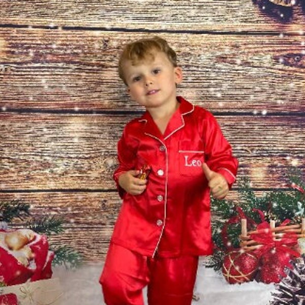 Satin family Christmas pyjamas in red or green with matching dog bandanas