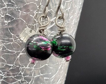 Black, green, and pink paint splatter earrings