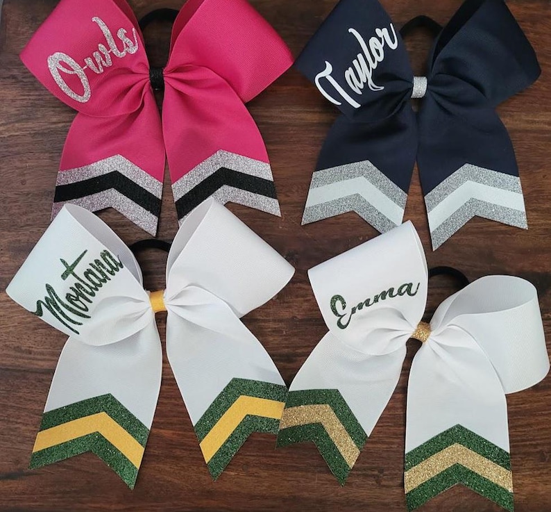 WHITE RIBBON with dark green/gold/dark green AND dark green/athletic yellow/dark green
Hot Pink ribbon with silver/black/silver
Navy ribbon with silver/white/silver