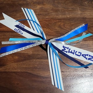 Custom Volleyball Hair Ribbons with 1 Glitter Name and 1 Number.