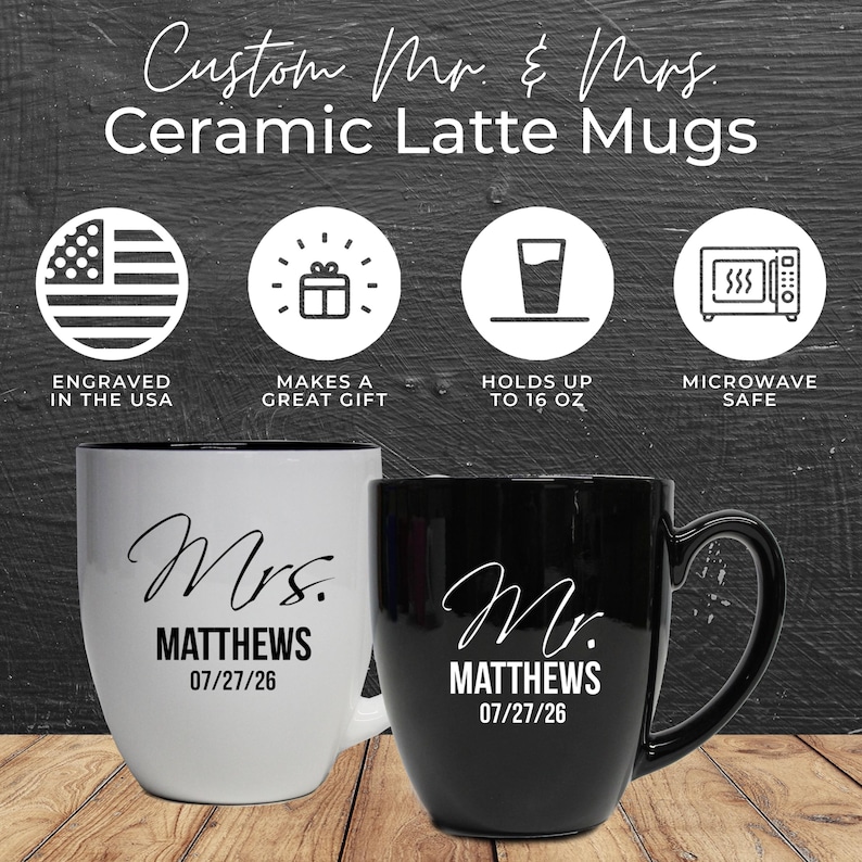 May include: Two ceramic latte mugs, one white and one black, with the text "Custom Mr. & Mrs." and the names "Mrs. Matthews" and "Mr. Matthews" with the date 07/27/26. The white mug has a black interior. The mugs hold up to 473 ml.