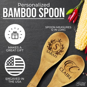 May include: Personalized bamboo spoons, engraved in the USA. Each spoon measures 12 inches long and features a custom design. One spoon has the name "Sarah" and the initial "S", the other has the name "Claire" and the initial "C". Makes a great gift.