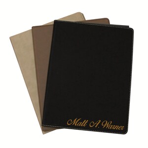 May include: Three rectangular document folders in black, brown, and tan, each featuring stitched edges. The front black folder is personalized with the gold-colored text Matt A. Warner engraved in a cursive script font at the bottom right corner.