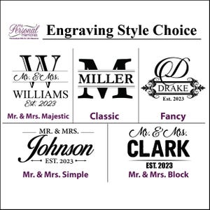 May include: A black and white graphic display titled Engraving Style Choice, featuring five distinct text-based design options labeled Mr. & Mrs. Majestic, Classic, Fancy, Mr. & Mrs. Simple, and Mr. & Mrs. Block, each showcasing sample names and dates.