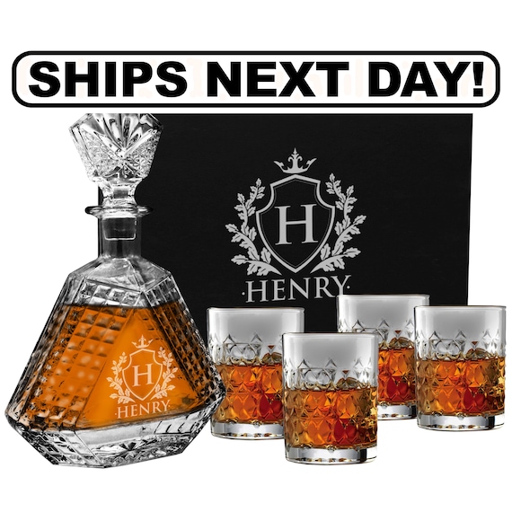 A geometric triangle-shaped etched decanter set — the angular silhouette is a genuine design departure from every other round or square decanter out there.