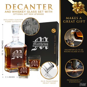 May include: A clear glass decanter and two rocks glasses set, each engraved with the name Matthews. The decanter is 10.5 inches tall and 5.5 inches wide. The set includes a black magnetic gift box with foam cutouts, a 23.75 oz decanter, and 9.5 oz glasses.
