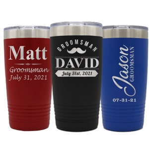 May include: Three stainless steel tumblers with personalized engravings. The red tumbler says "Matt Groomsman July 31, 2021". The black tumbler says "Groomsman David July 31st, 2021" with a mustache graphic. The blue tumbler says "Jason Groomsman 07-31-21".
