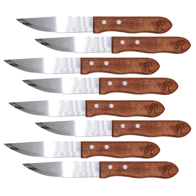 May include: Set of six stainless steel steak knives with brown wooden handles. Each handle has the letter "R" engraved on it.