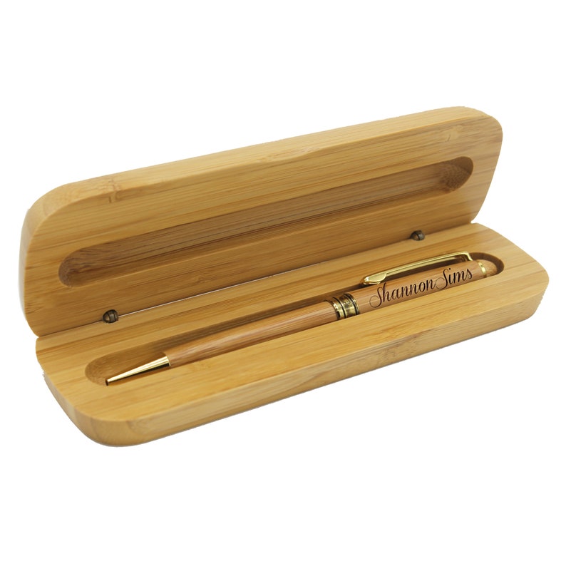 May include: A bamboo pen and case set with the name "Shannon Sims" engraved on the pen.