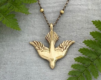 Antiqued Brass Descending Dove Necklace: Unique Hand Carved Design
