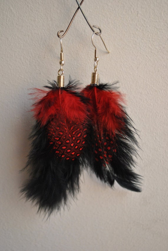 Items similar to Black and Red Feather Earrings on Etsy
