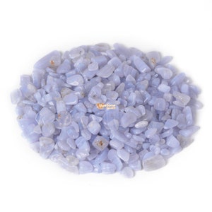 May include: A large pile of light blue and white agate tumbled stones. The stones are smooth and polished, and they have a natural, organic shape.