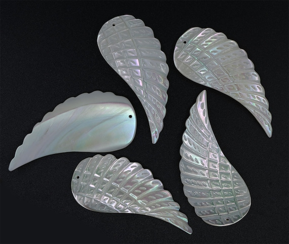 Carved Black Mother Of Pearl Wing W/Labradorite Necklace Carved Black Mother Of Pearl Wing W/Labradorite Necklace