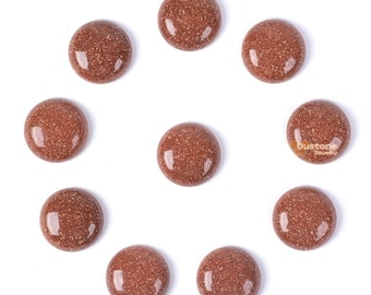 May include: Ten round, smooth, brown stones with a speckled texture. The stones are arranged in a circle on a white background.