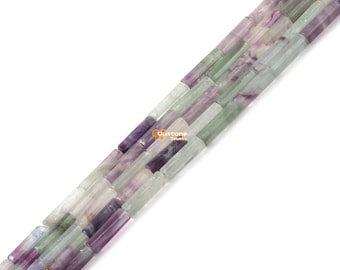 May include: A strand of green, purple, and white fluorite beads. The beads are cylindrical and have a smooth, polished finish. The beads are strung on a clear elastic cord.