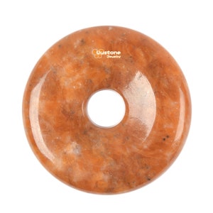 Conta focal com pingente de donut de calcita laranja de 40 mm