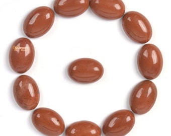 May include: A circle of 12 smooth, oval-shaped red jasper stones arranged on a white background.
