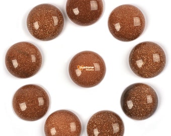 May include: Ten round, brown, gemstone cabochons with a sparkly, textured surface.