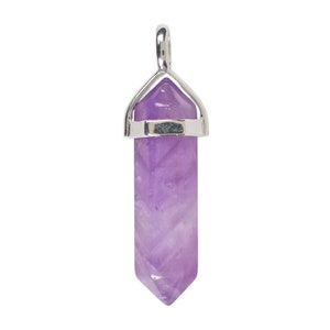 May include: A purple amethyst crystal point pendant with a silver setting. The crystal is faceted and has a pointed tip.
