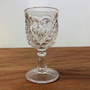 May include: A set of three ceramic mugs with a speckled, matte finish. The mugs are in shades of cream, light gray, and dark gray. Each mug has a simple, minimalist design, perfect for coffee or tea.