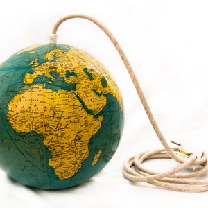 Lamp made of a vintage glass globe from 1950 with linen cord
