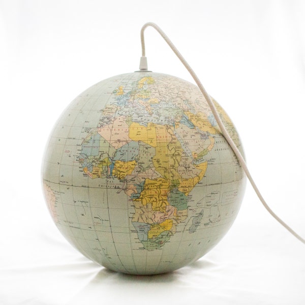 Lamp made of a vintage globe from the 1987 with cotton braided wire