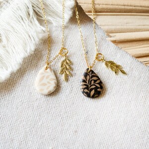 Leaf floral drop necklace cream black gold branch image 4