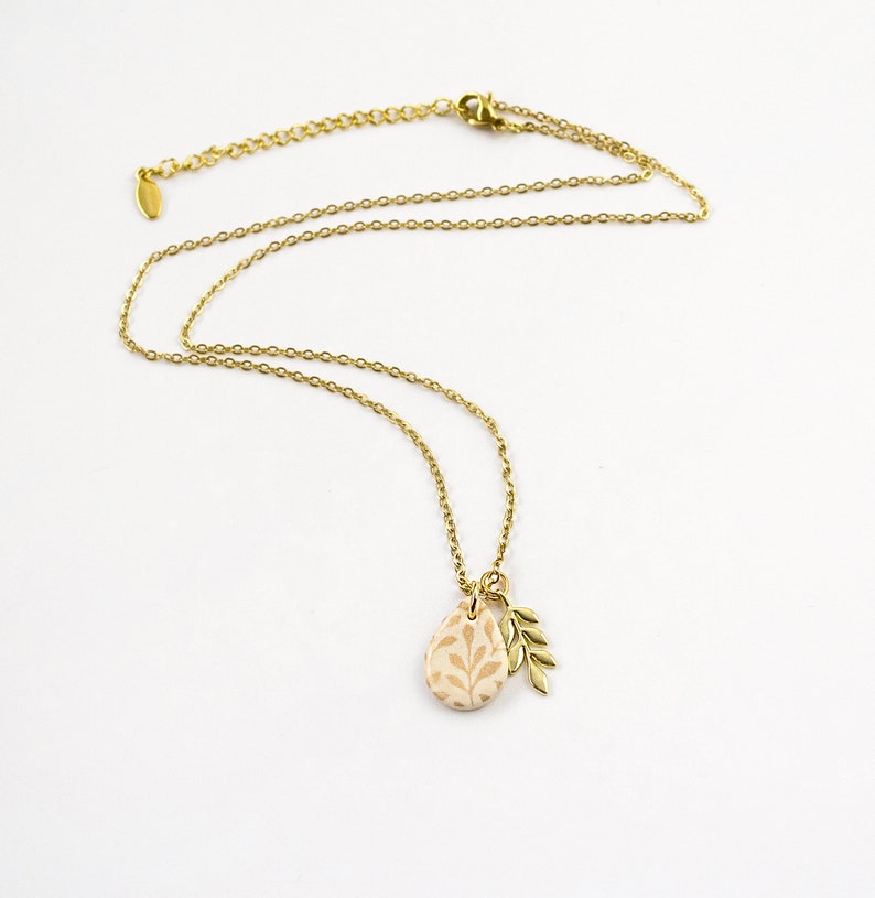Leaf floral drop necklace cream black gold branch image 5