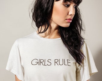 Statement T-shirt in white with saying embroidered short sleeved bamboo