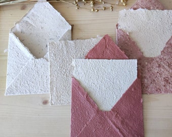 Writing paper, handmade envelopes made from recycled paper, greeting cards, square envelopes with cards