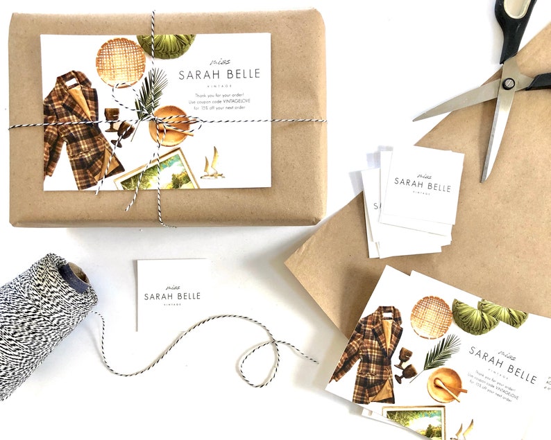 May include: A brown paper package tied with twine and a white and black patterned string. The package has a white gift tag with the text "miss sarah belle vintage" and a watercolor illustration of a plaid jacket, a woven basket, a potted plant, and a vintage postcard.