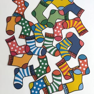 May include: A collection of colorful socks with various patterns, including polka dots, stripes, and color blocks. The socks are in shades of red, blue, green, yellow, and orange. The socks are arranged on a white background.