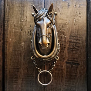 Draft or Plow Horse, Horse Head Door Knocker with a Classic Brown Patina Finish and buffed high lights. Horse Collar is the Knocker!